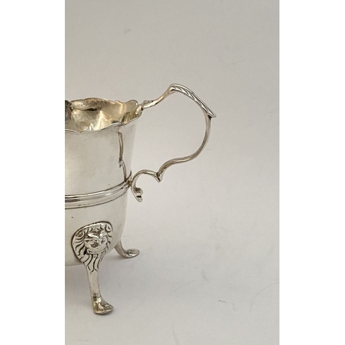 20 - A GEORGE II IRISH SILVER CREAM JUG, Dublin c.1750, nice simple form with gadrooned rim, double scrol... 