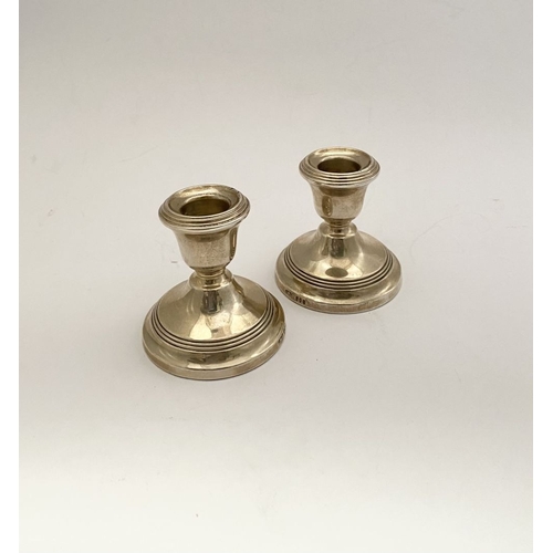 21 - A PAIR OF EARLY 20TH CENTURY IRISH SILVER CANDLESTICKS, Hallmarked Jewellery & Metal Manufacturing C... 