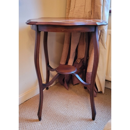 211 - A GOOD EDWARDIAN STYLE SERPENTINE SHAPED SIDE TABLE / LAMP TABLE, with stepped shaped edge to the ta... 