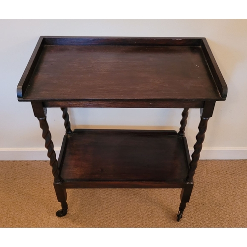 218 - A 20TH CENTURY DRINKS TROLLEY / SIDE TABLE, with raised three quarter gallery edge to the top, raise... 