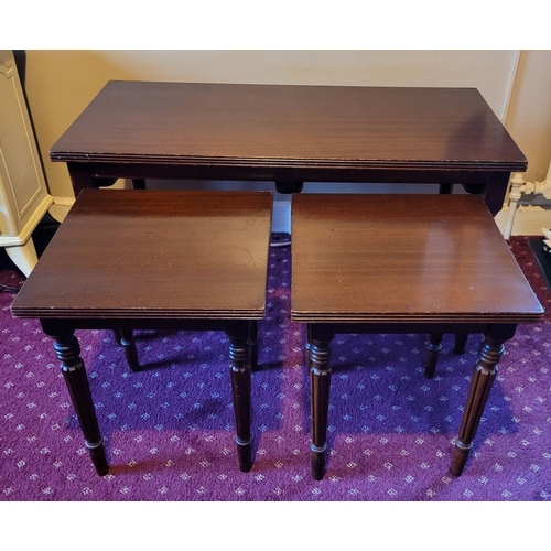 221 - A GOOD MAHOGANY NEST OF THREE TABLES; with long rectangular top table and two smaller square shaped ... 