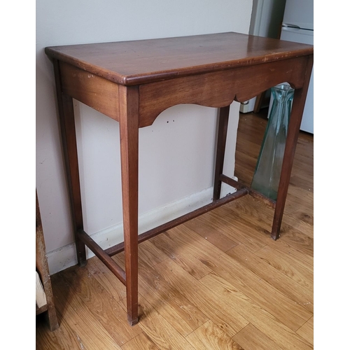 225 - A GOOD QUALITY MAHOGANY HALL / SIDE TABLE, with shaped skirt to the front raised on tapered legs, un... 