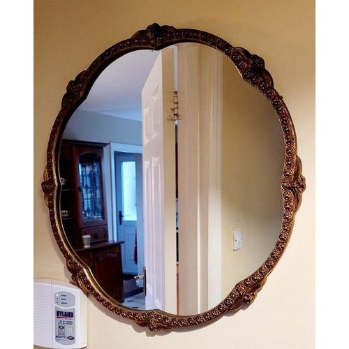 226 - TWO VINTAGE WALL MIRRORS, (i) A CIRCULAR WALL MIRROR with barley twist style glass open frame having... 