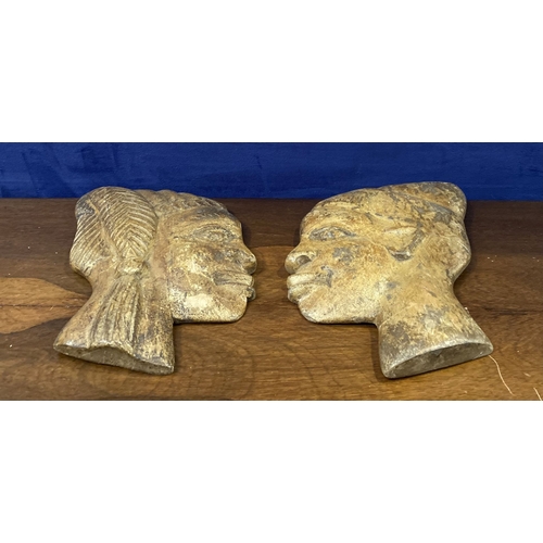 243 - A PAIR OF CARVED AFRICAN BUSTS IN PROFILE, hardwood carvings, can be mounted on a wall. Dimensions: ... 