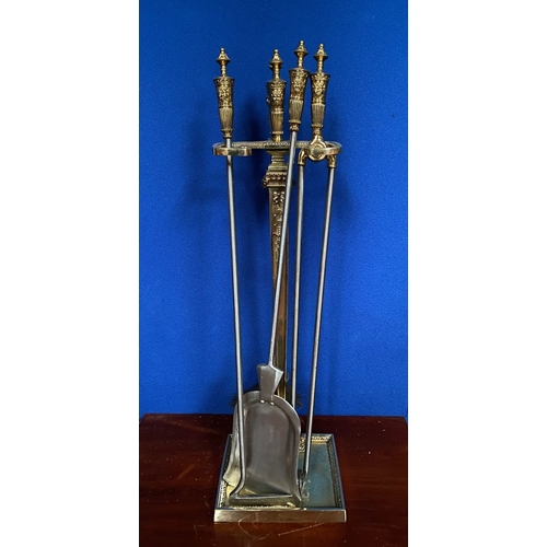 247 - AN EXCELLENT BRASS & STEEL FIRE COMPANION SET, on stand. To include tongs, brush, shovel and poker, ... 