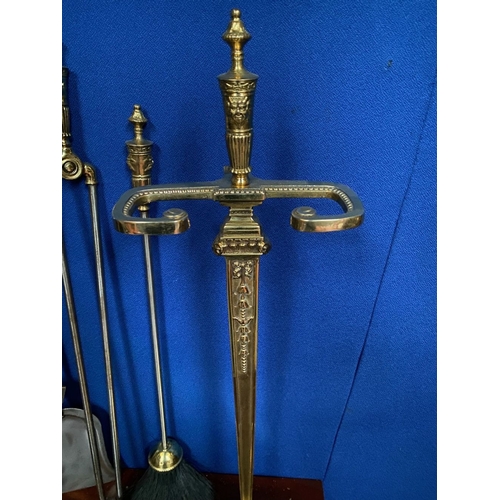 247 - AN EXCELLENT BRASS & STEEL FIRE COMPANION SET, on stand. To include tongs, brush, shovel and poker, ... 