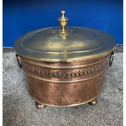 248 - A COPPER & BRASS OVAL SHAPED LOG/COAL BOX, the copper body with embossed panel, horse shoe handles t... 