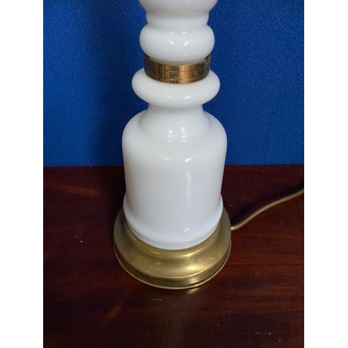 250 - A VICTORIAN MILK GLASS TABLE LAMP, converted oil lamp, the font with nice molded fluting. In working... 