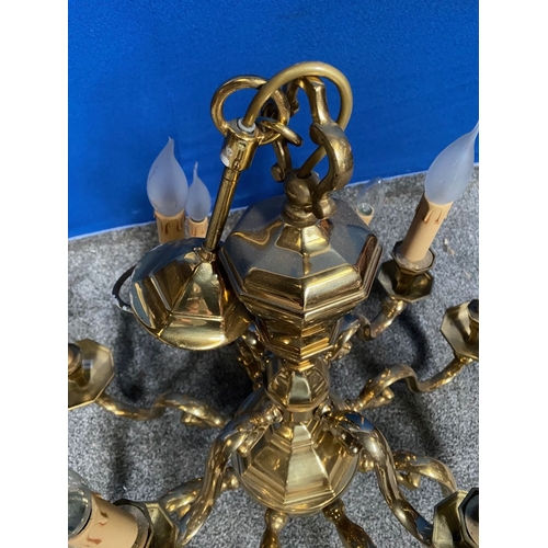 251 - A GOOD TWO TIER BRASS CHANDELIER, in working order. With four branches to top tier and eight branche... 