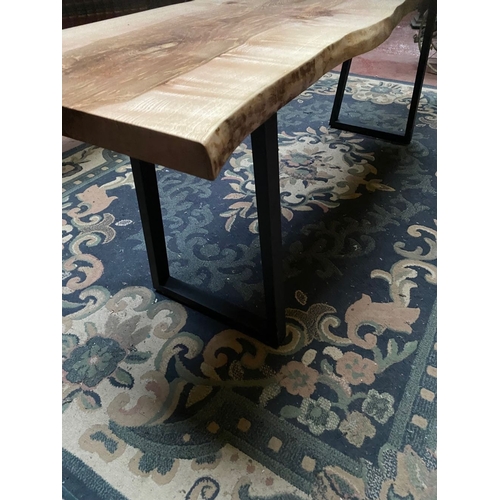 258 - A LONG RECLAIMED WOOD COFFEE TABLE, could be walnut/elm, on steel side supports. Dimensions: 214cm l... 