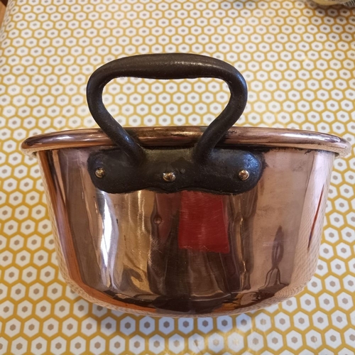 264 - A 19TH CENTURY TWO HANDLED COPPER PRESERVING PAN, 29cm diameter, 13cm tall.