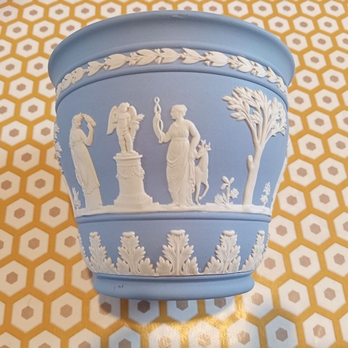 267 - A WEDGEWOOD BLUE JASPERWARE JARDINIERE POT, 13cm wide, 11cm tall.