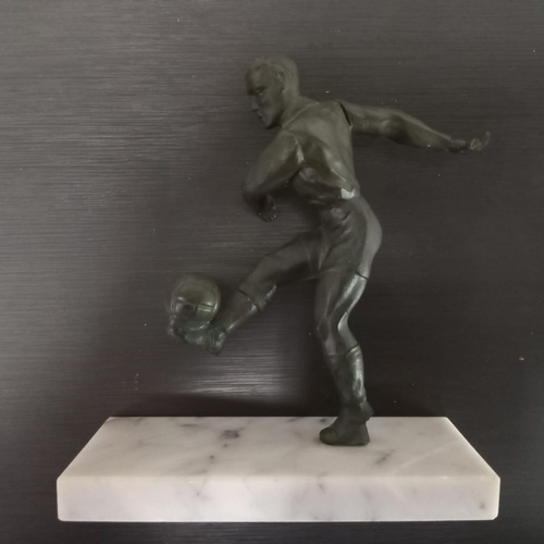 276 - AN ART DECO PATINATED METAL STUDY OF A FOOTBALLER, resting on a marble base. 20 x 19 x 7cm. (H x W x... 