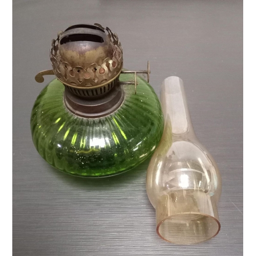 278 - A VICTORIAN GREEN GLASS OIL LAMP, with clear glass chimney. 37cm high overall 16cm diameter