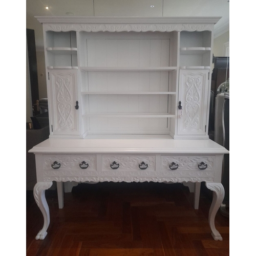 279 - A LARGE SOLID MAHOGANY PAINTED DRESSER, with cornice above carving, open shelves to centre with cupb... 