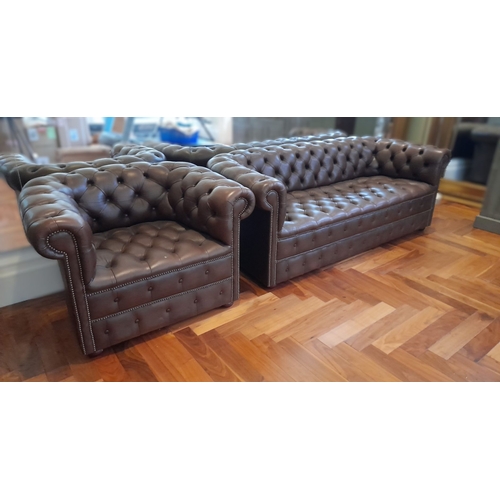 282 - AN EXCELLENT CHESTERFIELD BROWN LEATHER THREE SEATER COUCH AND ARMCHAIR, both have deep button uphol... 