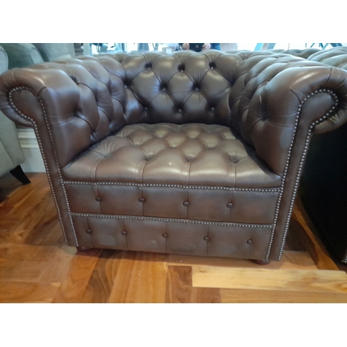 282 - AN EXCELLENT CHESTERFIELD BROWN LEATHER THREE SEATER COUCH AND ARMCHAIR, both have deep button uphol... 