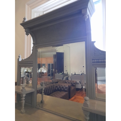 283 - A LARGE SOLID MAHOGANY PAINTED MIRROR BACKED DRESSER, with large mirror to back and two smaller to s... 