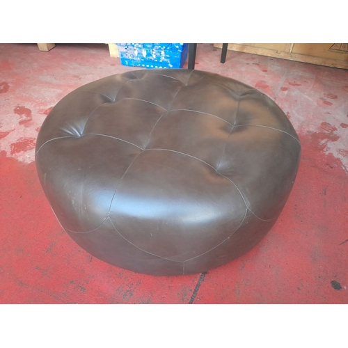 288 - A LARGE LEATHER UPHOLSTERED OTTOMAN, circular form with button upholstery to top. Dimensions: 100cm ... 