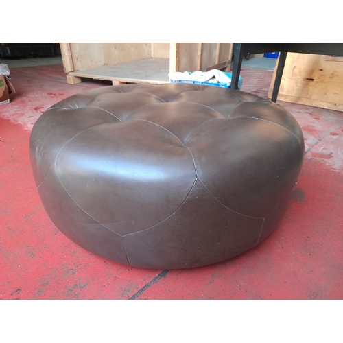 288 - A LARGE LEATHER UPHOLSTERED OTTOMAN, circular form with button upholstery to top. Dimensions: 100cm ... 