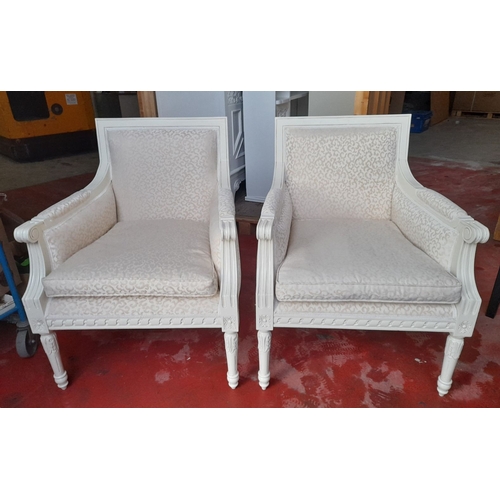 292 - A PAIR OF WHITE PAINTED FRENCH STYLE ARMCHAIRS, with upholstered backrest and seat, carved armrests ... 