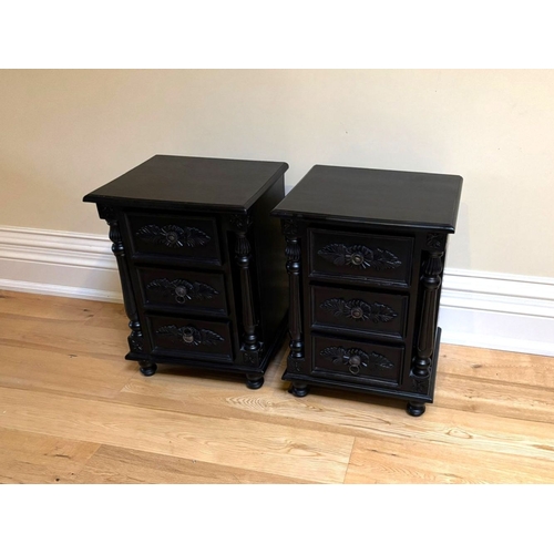 295 - A PAIR OF BLACK PAINTED THREE DRAWER CHESTS/LOCKERS, the three drawers with carvings, as well as flu... 