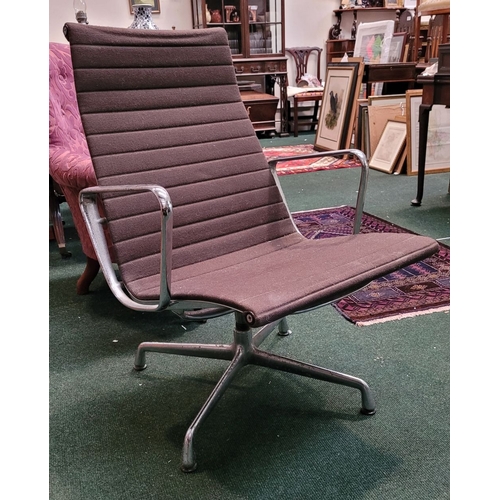 299 - A VINTAGE EAMES ALU CHAIR, with soft brown upholstery, label to the support states: Original Eames A... 