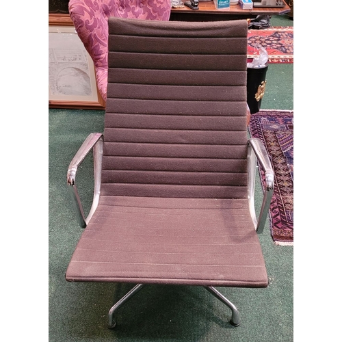 299 - A VINTAGE EAMES ALU CHAIR, with soft brown upholstery, label to the support states: Original Eames A... 