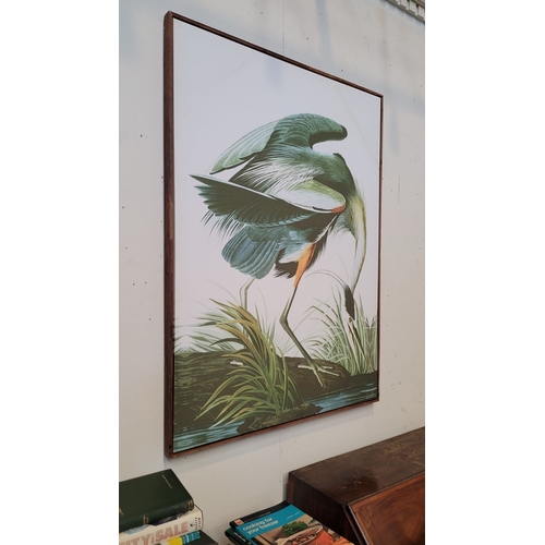 308 - A LARGE DECORATIVE PRINT ON CANVAS, depicting a heron amongst reeds and water. Dimensions: 113 x 83.... 