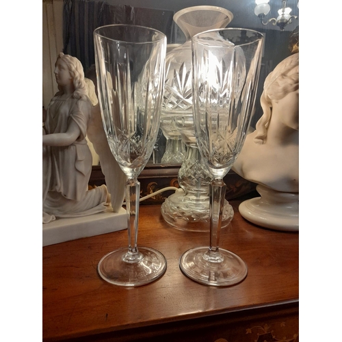 319 - A PAIR OF WATERFORD CRYSTAL MARQUIS CHAMPAGNE FLUTES, in excellent condition. 24cm tall x 7cm wide a... 