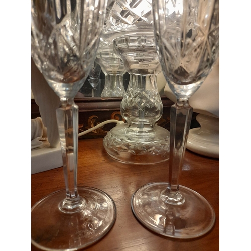 319 - A PAIR OF WATERFORD CRYSTAL MARQUIS CHAMPAGNE FLUTES, in excellent condition. 24cm tall x 7cm wide a... 