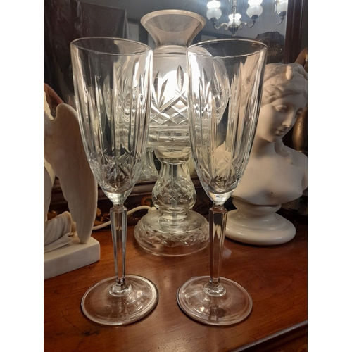 319 - A PAIR OF WATERFORD CRYSTAL MARQUIS CHAMPAGNE FLUTES, in excellent condition. 24cm tall x 7cm wide a... 