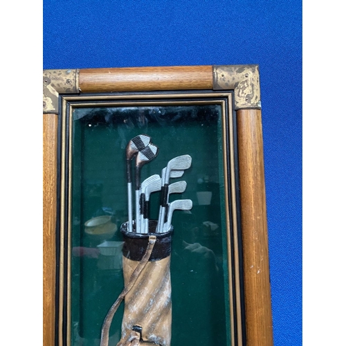 325 - GOLF MEMORABILIA: A FRAMED GOLF BAG WITH CLUBS AND GOLF BALLS, the hardwood frame with metal fitting... 