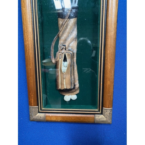 325 - GOLF MEMORABILIA: A FRAMED GOLF BAG WITH CLUBS AND GOLF BALLS, the hardwood frame with metal fitting... 