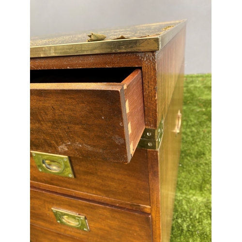 328 - A MAHOGANY MILITARY CAMPAIGN DESK, with tooled leather top, fitted with one long and eight short dra... 