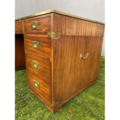 328 - A MAHOGANY MILITARY CAMPAIGN DESK, with tooled leather top, fitted with one long and eight short dra... 