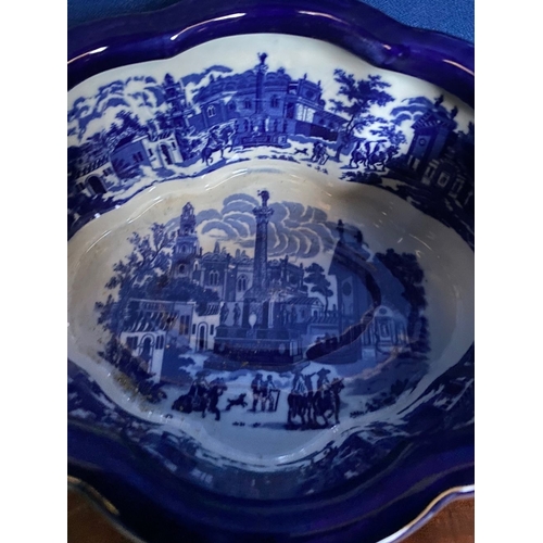 35 - A BLUE & WHITE FOOTBATH/PLANTER, nice shape with painted town scenes to interior and exterior, with ... 