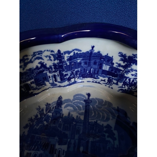 35 - A BLUE & WHITE FOOTBATH/PLANTER, nice shape with painted town scenes to interior and exterior, with ... 