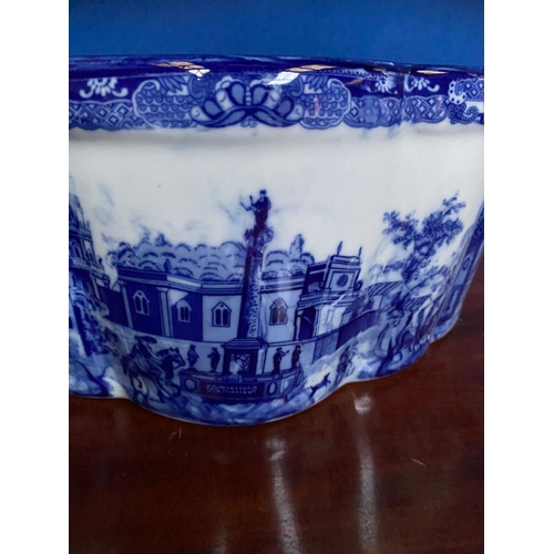 35 - A BLUE & WHITE FOOTBATH/PLANTER, nice shape with painted town scenes to interior and exterior, with ... 