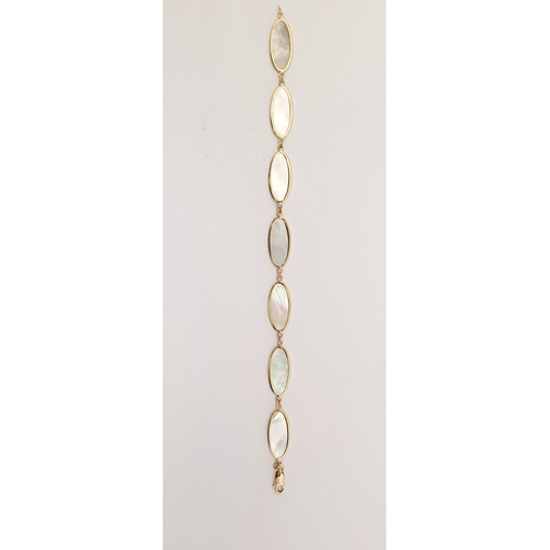 36 - A LOVELY 9CT YELLOW GOLD MOTHER OF PEARL PANEL BRACELET, this piece is really elegant. The beautiful... 