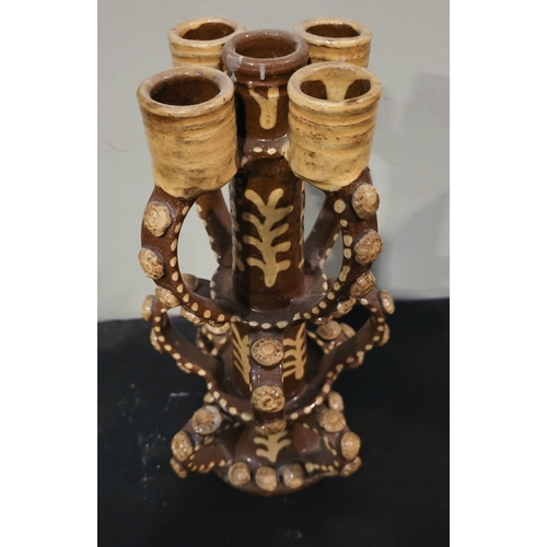 43 - A VINTAGE HAND FORMED & GLAZED CANDELABRA STAND, created in the form of the candlesticks found in Wr... 