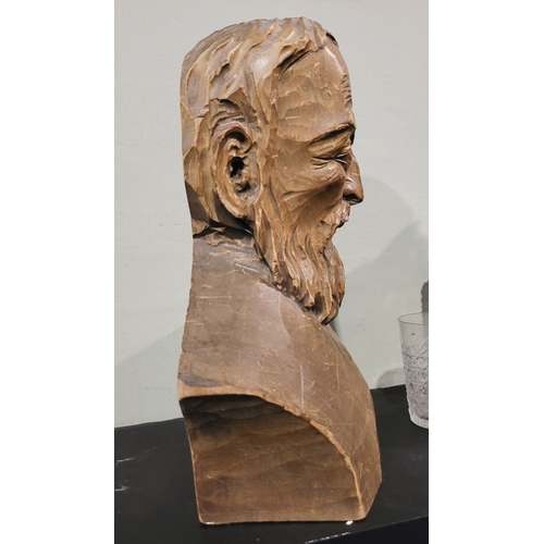 44 - A LARGE CARVED WOODEN BUST OF A BEARDED MAN, the solid piece of wood is carved to the front & sides;... 