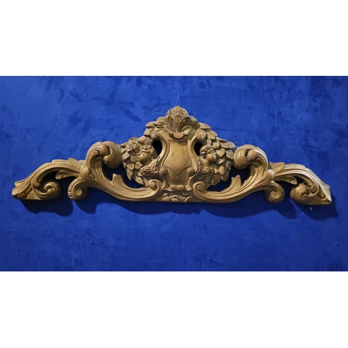 46 - A LARGE HEAVY GILT COLOURED FURNITURE / WALL PEDIMENT PIECE, decorated with a large shield shaped ca... 