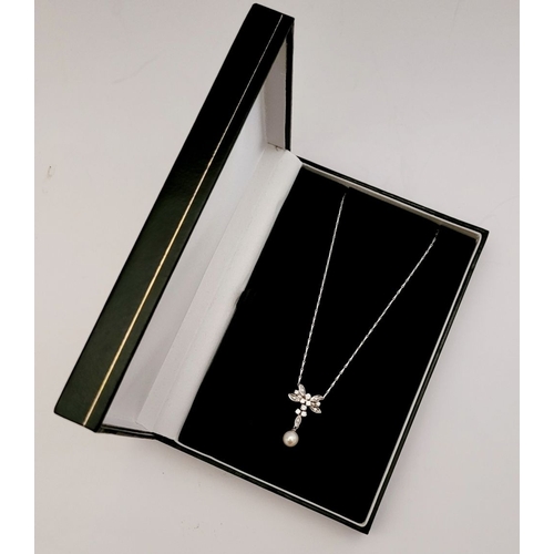 57 - A BESPOKE 18CT WHITE GOLD CHAIN WITH DIAMOND & PEARL PENDANT, finely crafted pendant with diamonds a... 