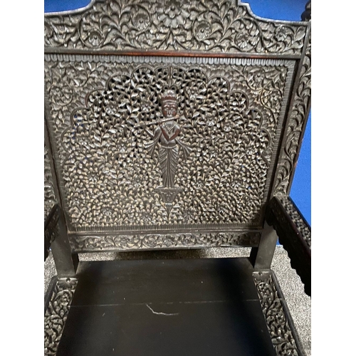 58 - AN IMPRESSIVE CARVED THRONE STYLE ROSEWOOD ARMCHAIR, decorated all over with scrolling foliage detai... 