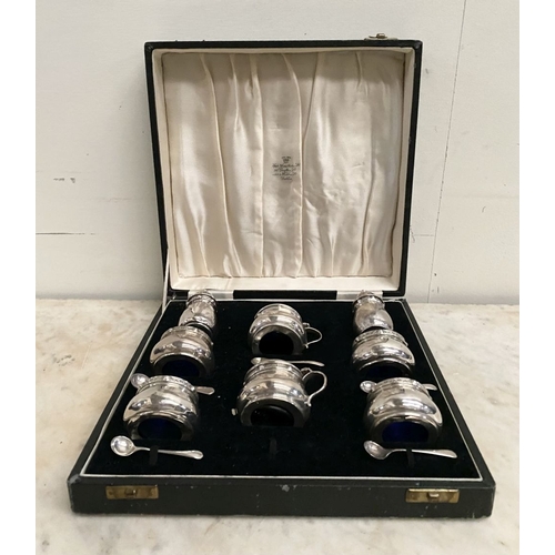 6 - A SILVER DOUBLE CONDIMENT SET IN FITTED CASE BY ‘WEIRS’ OF DUBLIN, to include two castors, two musta... 