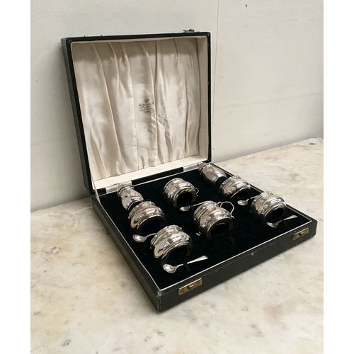 6 - A SILVER DOUBLE CONDIMENT SET IN FITTED CASE BY ‘WEIRS’ OF DUBLIN, to include two castors, two musta... 