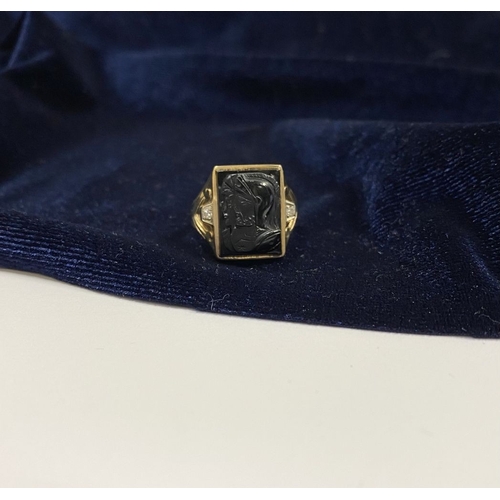 66 - AN EXCELLENT GOLD, DIAMOND & CARVED BLACK ONYX INTAGLIO SIGNET RING, with rectangular carved black o... 