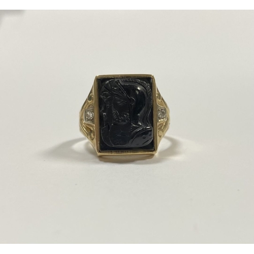 66 - AN EXCELLENT GOLD, DIAMOND & CARVED BLACK ONYX INTAGLIO SIGNET RING, with rectangular carved black o... 