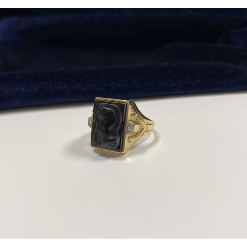 66 - AN EXCELLENT GOLD, DIAMOND & CARVED BLACK ONYX INTAGLIO SIGNET RING, with rectangular carved black o... 